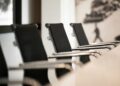 Empty corporate conference room, a contextual image for reporting on alleged covert recording in a technology company.