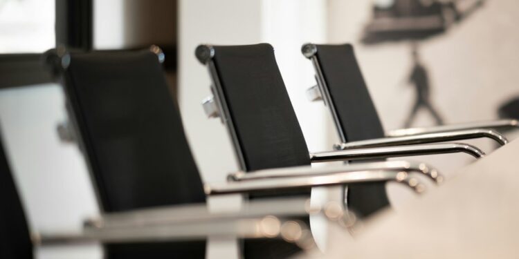 Empty corporate conference room, a contextual image for reporting on alleged covert recording in a technology company.