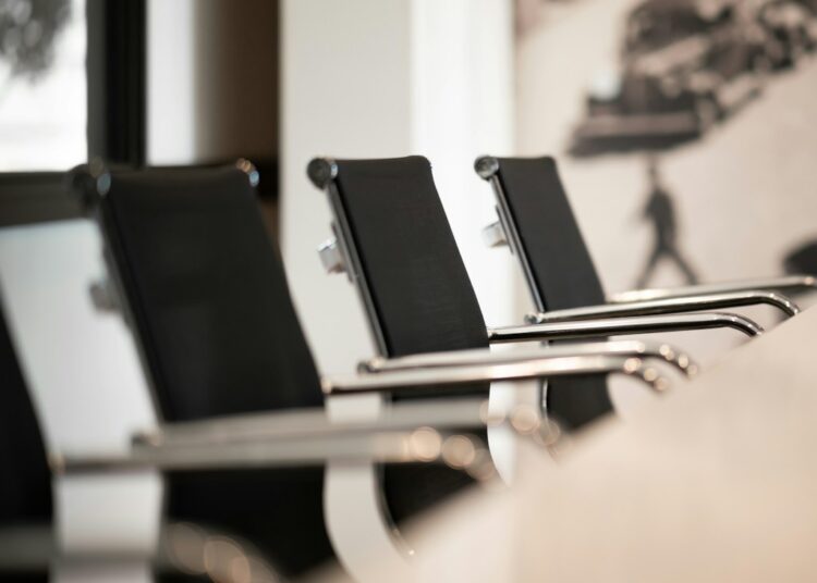 Empty corporate conference room, a contextual image for reporting on alleged covert recording in a technology company.
