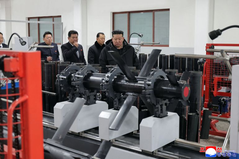 North Korean leader Kim Jong Un inspects weapons production equipment at a munitions facility in January 2026