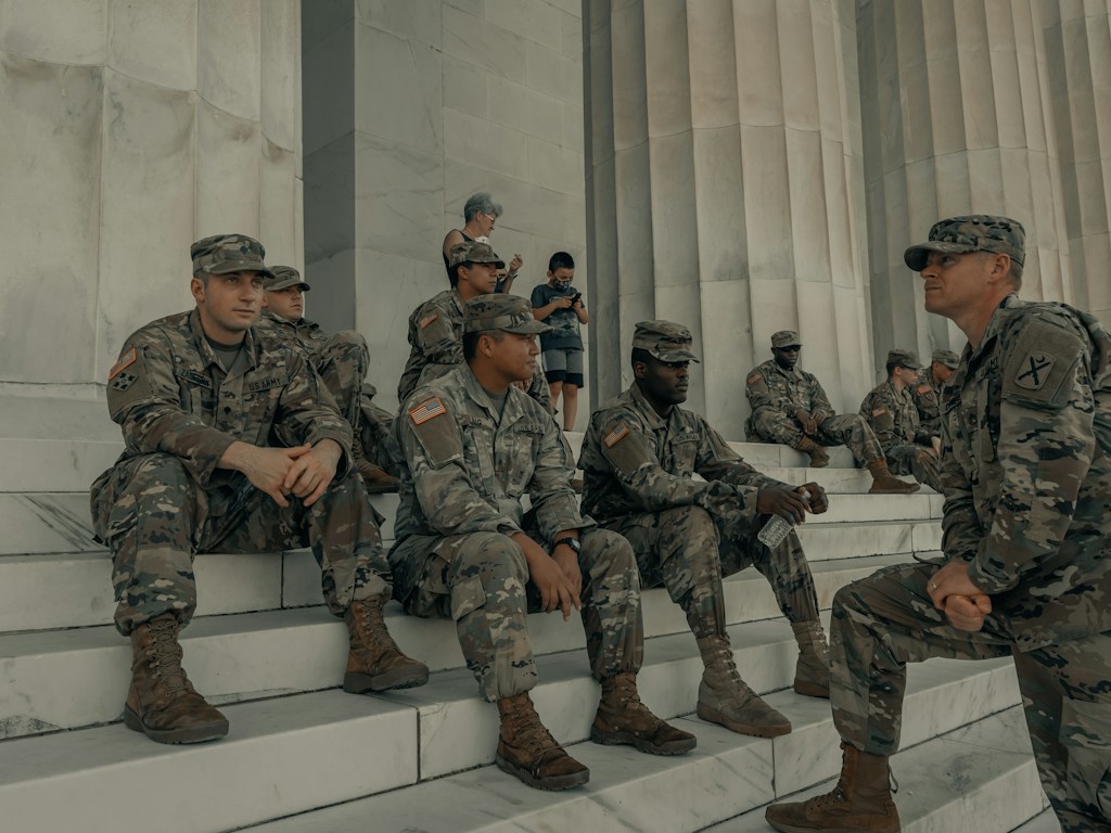 US Army personnel near the Lincoln Memorial, an illustrative image for reporting on veterans' mental healthcare.